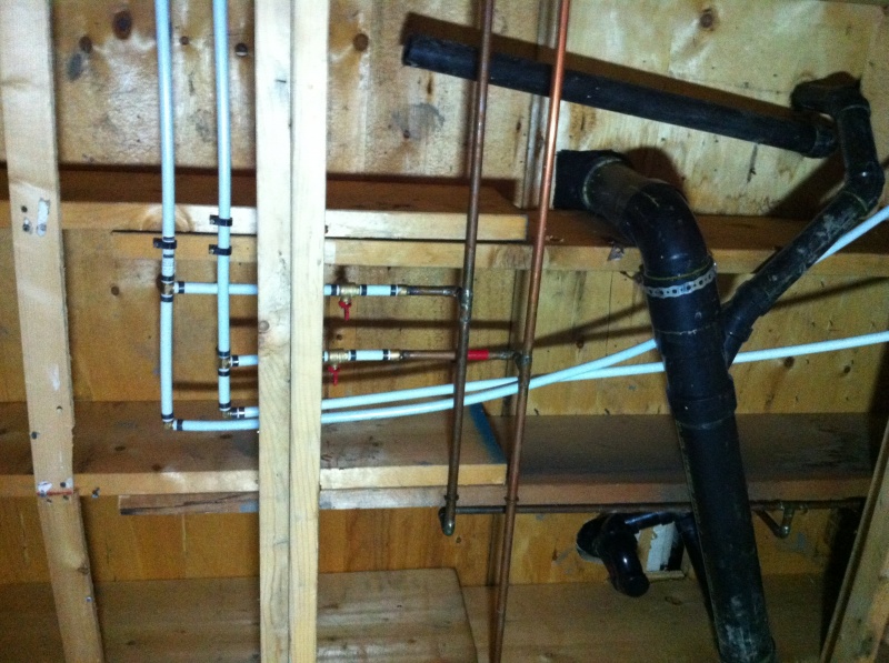 Installing the new Pex system for water to the bar, bathroom sink and tub.